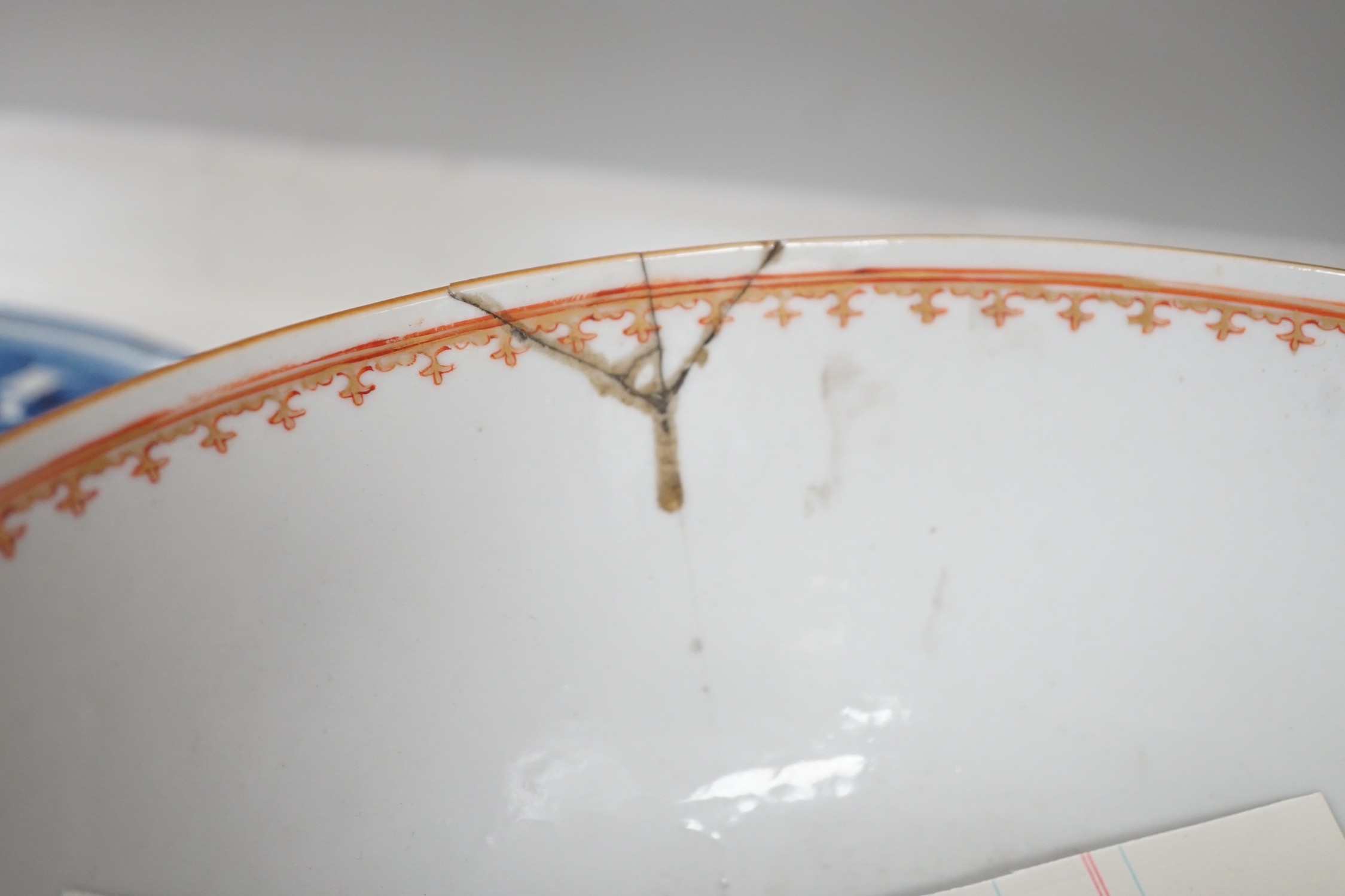 An assortment of Chinese porcelain tin-glazed earthenware charger and a Delft vase